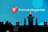 Partileiar Siv Jensen på talarstolen på Framstegspartiets landsmøte på Gardermoen førre helg.