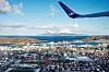 SAS-fly over Bodø sentrum, med Landegode i horisonten.