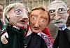 Performers pose with puppet caricatures of Britain’s Prime Minister Theresa May, leader of the Liberal Democrat Party Tim Farron and leader of the Labour Party Jeremy Corbyn, in front of the Palace of Westminster in London, Britain June 8, 2017. REUTERS/Marko Djurica