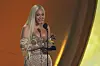 Beyonce accepts the award for best country album for 'COWBOY CARTER' during the 67th annual Grammy Awards on Sunday, Feb. 2, 2025, in Los Angeles. (AP Photo/Chris Pizzello)