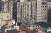 Debris and damaged buildings in the aftermath of Israeli strikes, amid escalating hostilities between Israel and Hezbollah, as the U.S.-Israeli conflict with Iran continues, in Beirut's southern suburbs, Lebanon, March 25, 2026. REUTERS/Amr Abdallah Dalsh