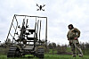 Ukrainian servicemen launch radio controlled and optic fibre controlled FPV-drones from an unmanned ground vehicle during testing at a training ground near a front line, amid Russia's attack on Ukraine, in Zaporizhzhia region, Ukraine April 10, 2026. REUTERS/Stringer