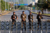 Police officers stand guard behind a barricade near Serena Hotel, as Pakistan prepares to host the U.S. and Iran for the second round of peace talks, in Islamabad, Pakistan, April 25, 2026. REUTERS/Asim Hafeezcha